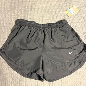 BRAND NEW women’s medium nike shorts! Very cute, comfortable, and dri-fit!